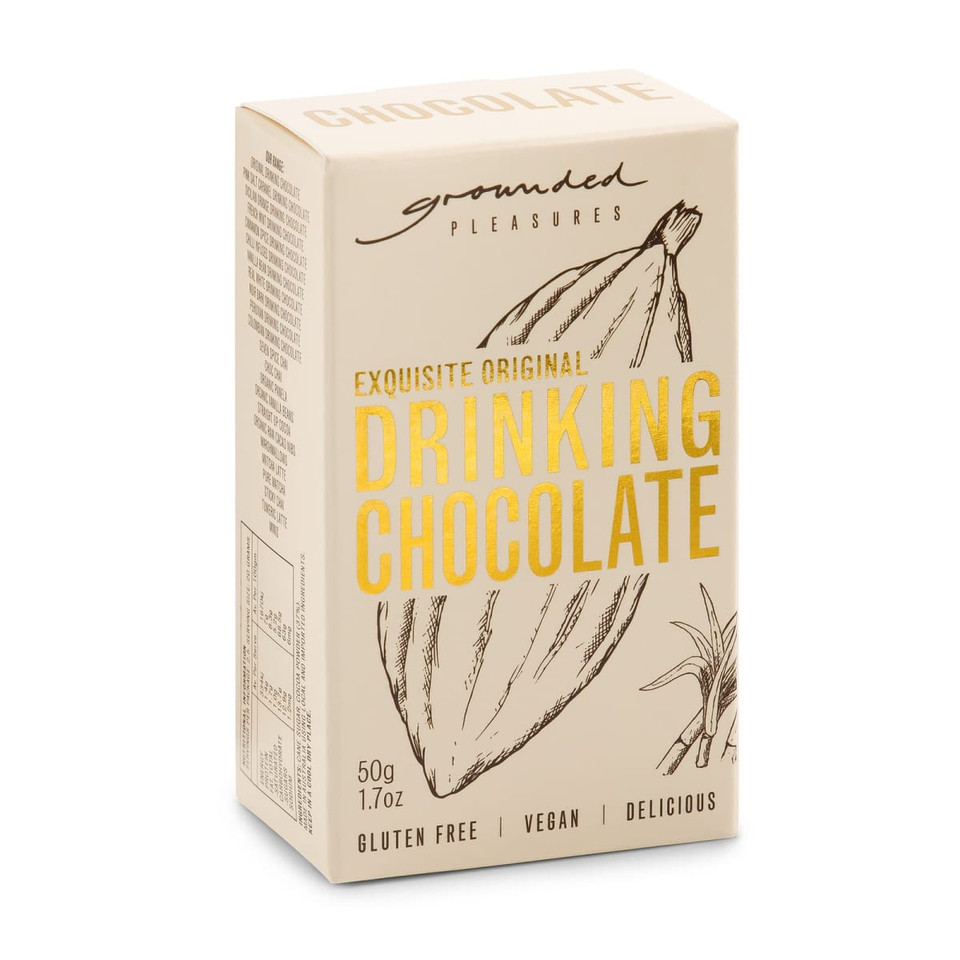 A box of drinking chocolate in beige with a logo, featuring ingredients and gluten-free, vegan labels.