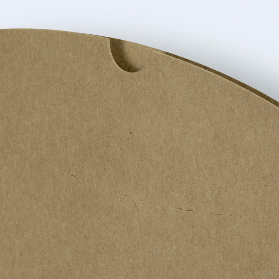 A large brown pillow box featuring a rounded top and a small cut-out for easy opening. It has a plain design.