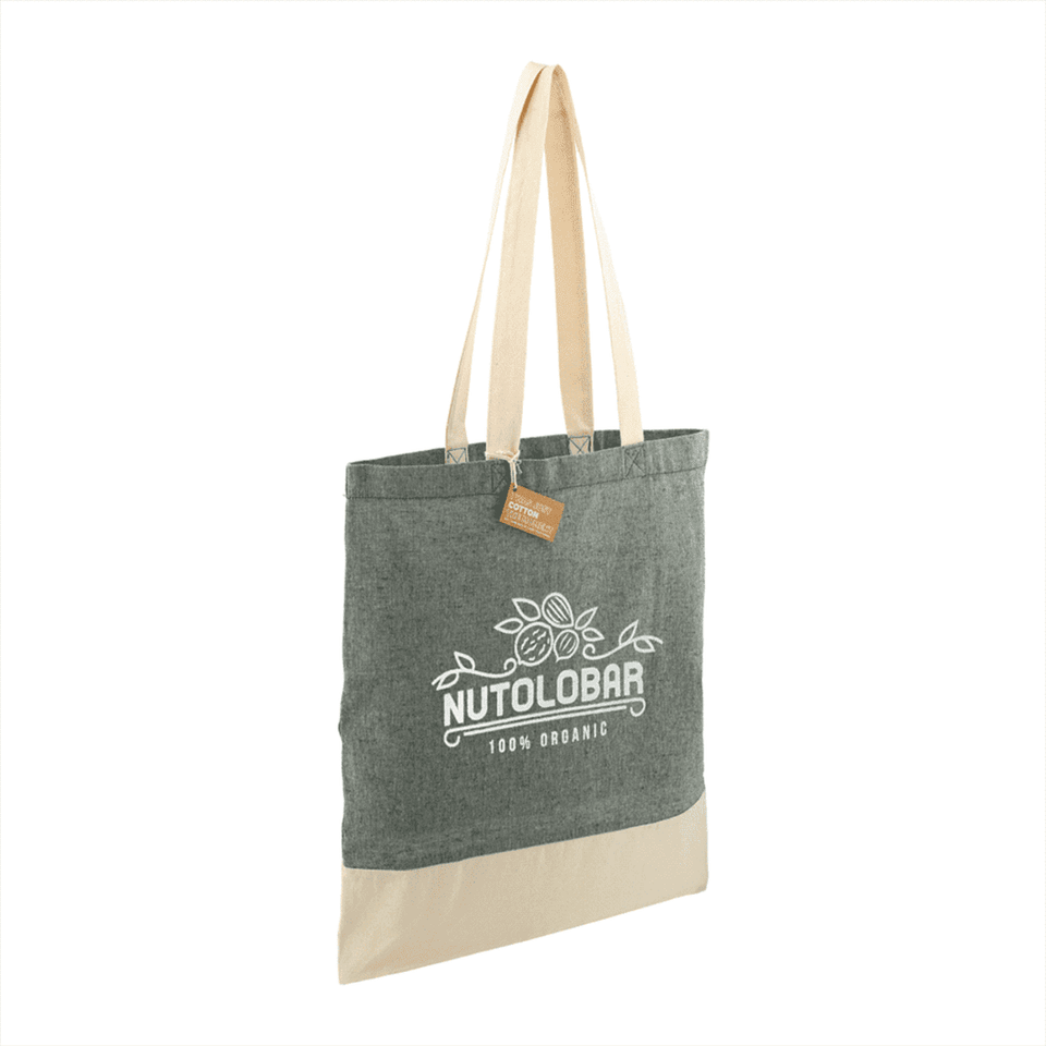 A green and beige tote bag made from recycled cotton twill, featuring a logo and long straps.