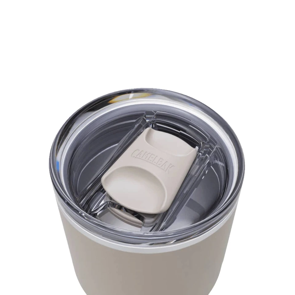 A drink bottle featuring a lid with a spout, in a light beige colour, with a clear rim and a logo.
