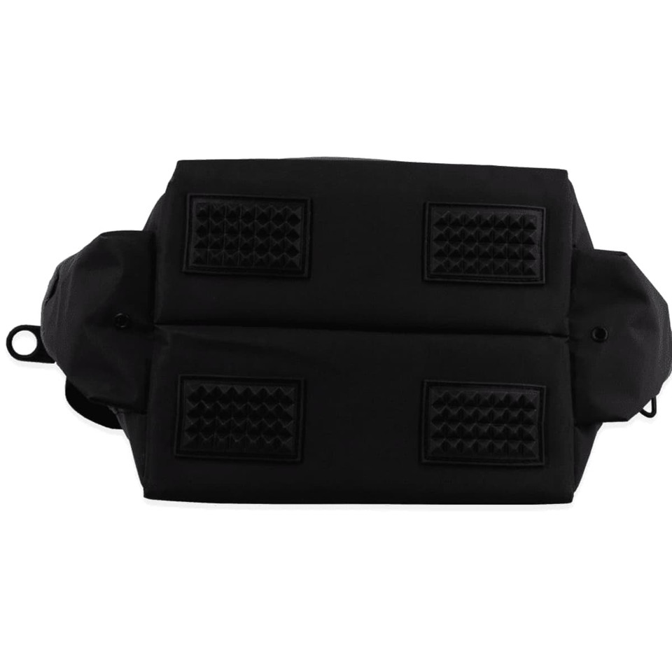 A black cooler bag with textured underside and two compartments, featuring a logo. Suitable for carrying beverages.