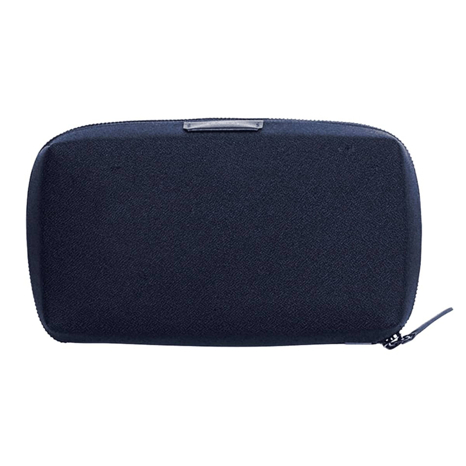 A black tech kit with a zip closure, featuring a sleek, minimal design and a branding logo.