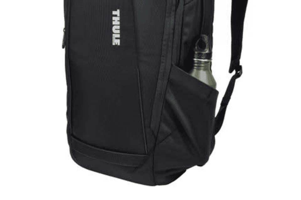 A black backpack with a side pocket holding a drink bottle and a logo.