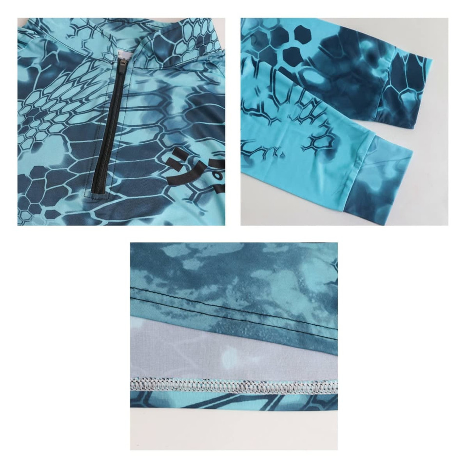 A close-up view of a blue sublimated 1/4 zip fishing pullover featuring a patterned design and a visible logo.