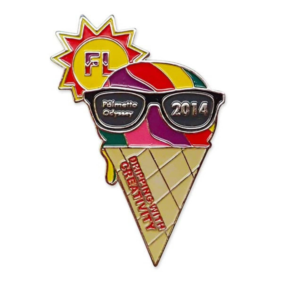 A colourful enamel pin featuring an ice cream cone with sunglasses, a sun in the background, and a logo.