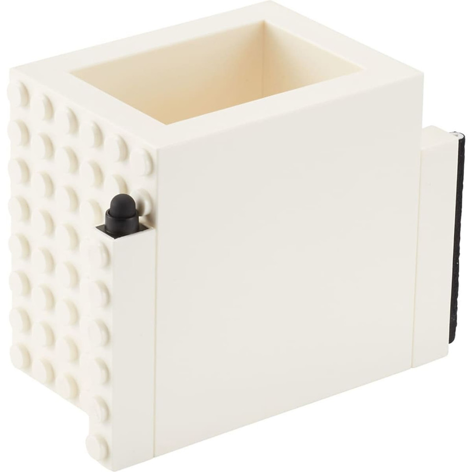 A white pen pot with a block design, featuring a black pen holder on the side.