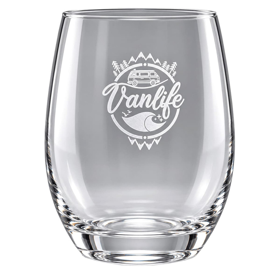 A clear stemless wine glass featuring an etched design related to "Vanlife" and outdoor themes.