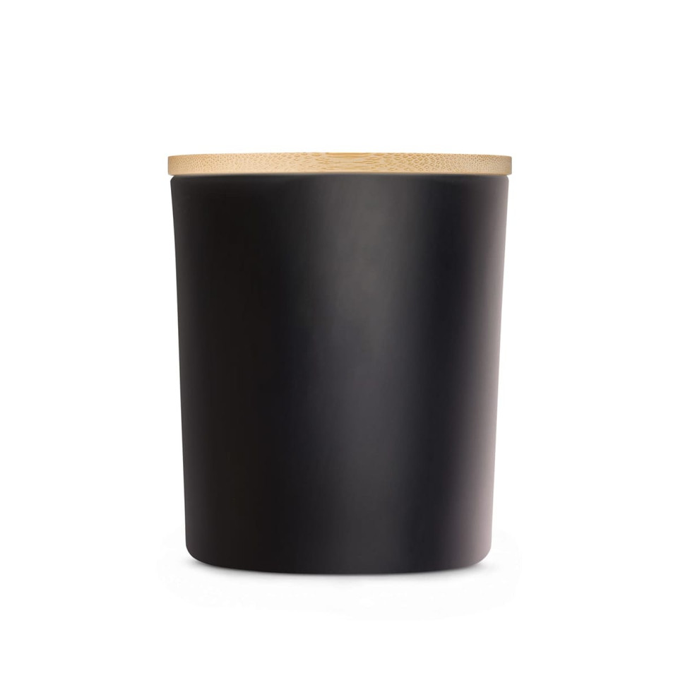 A large black glass candle with a natural wood lid. The candle features a sleek, modern design.