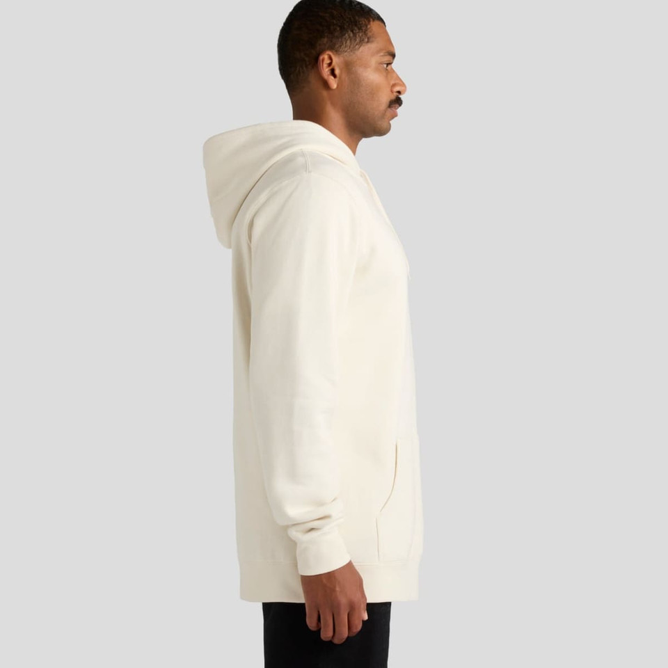 A cream-coloured hoodie with a hood, featuring a side view of a model. It has a simple design and logo.