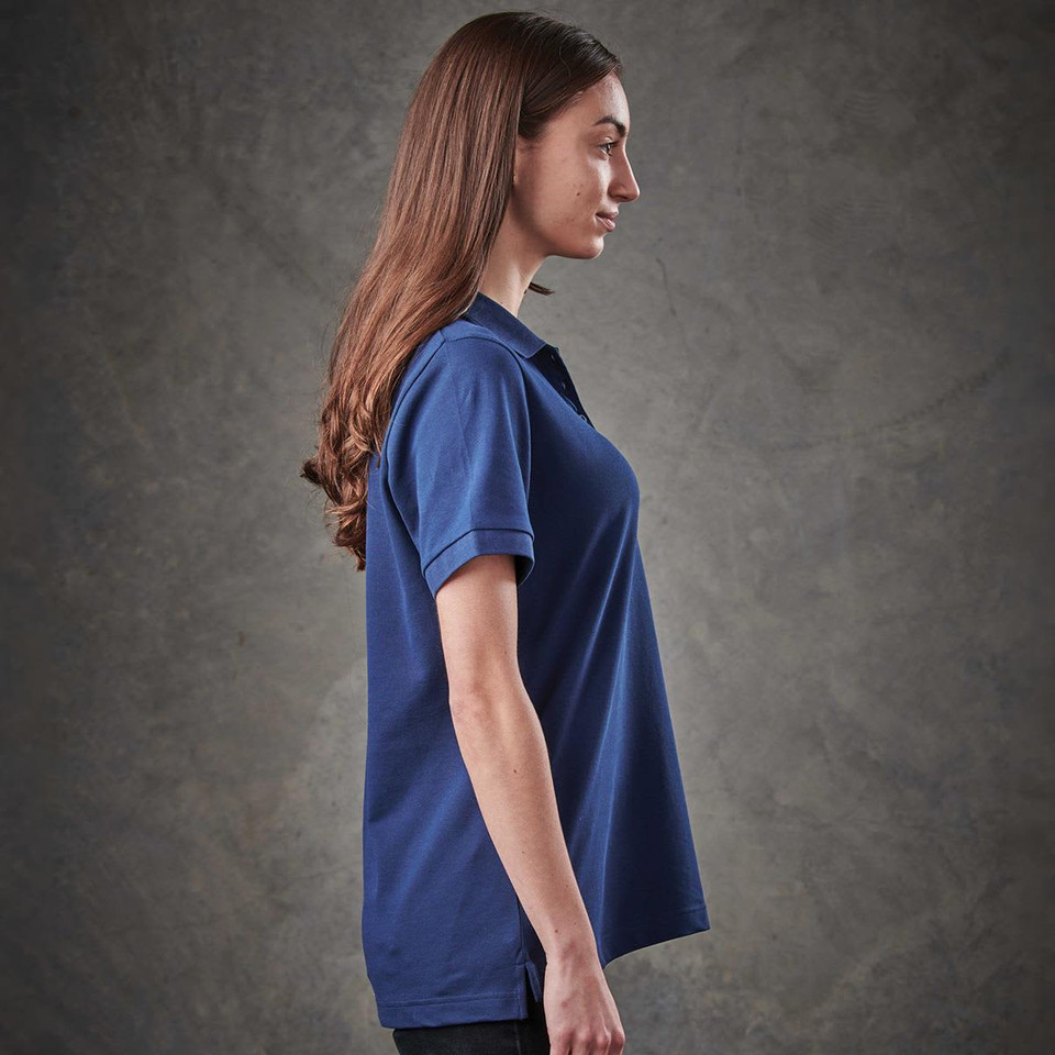 A women's navy polo shirt with a classic fit and short sleeves. Features a logo on the chest.