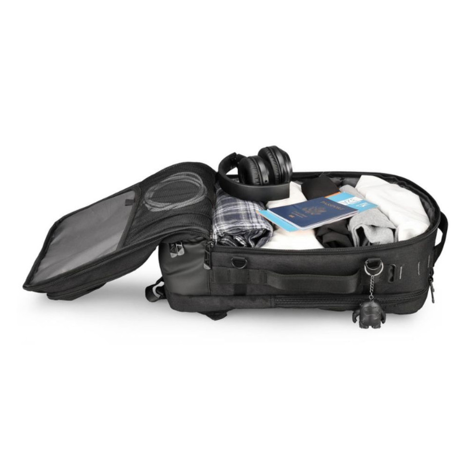 Open travel backpack with clothes, headphones, and a passport for packing essentials.