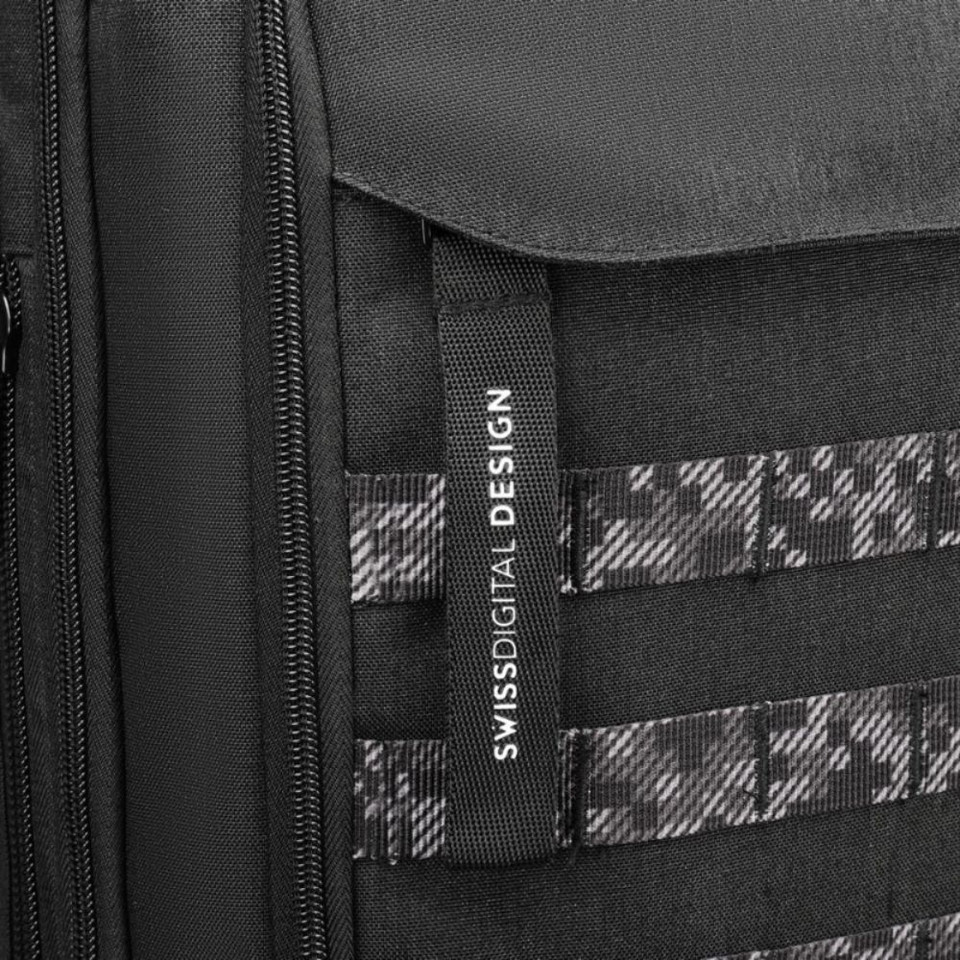 Close-up of Swissdigital Design black backpack with digital camouflage accents.