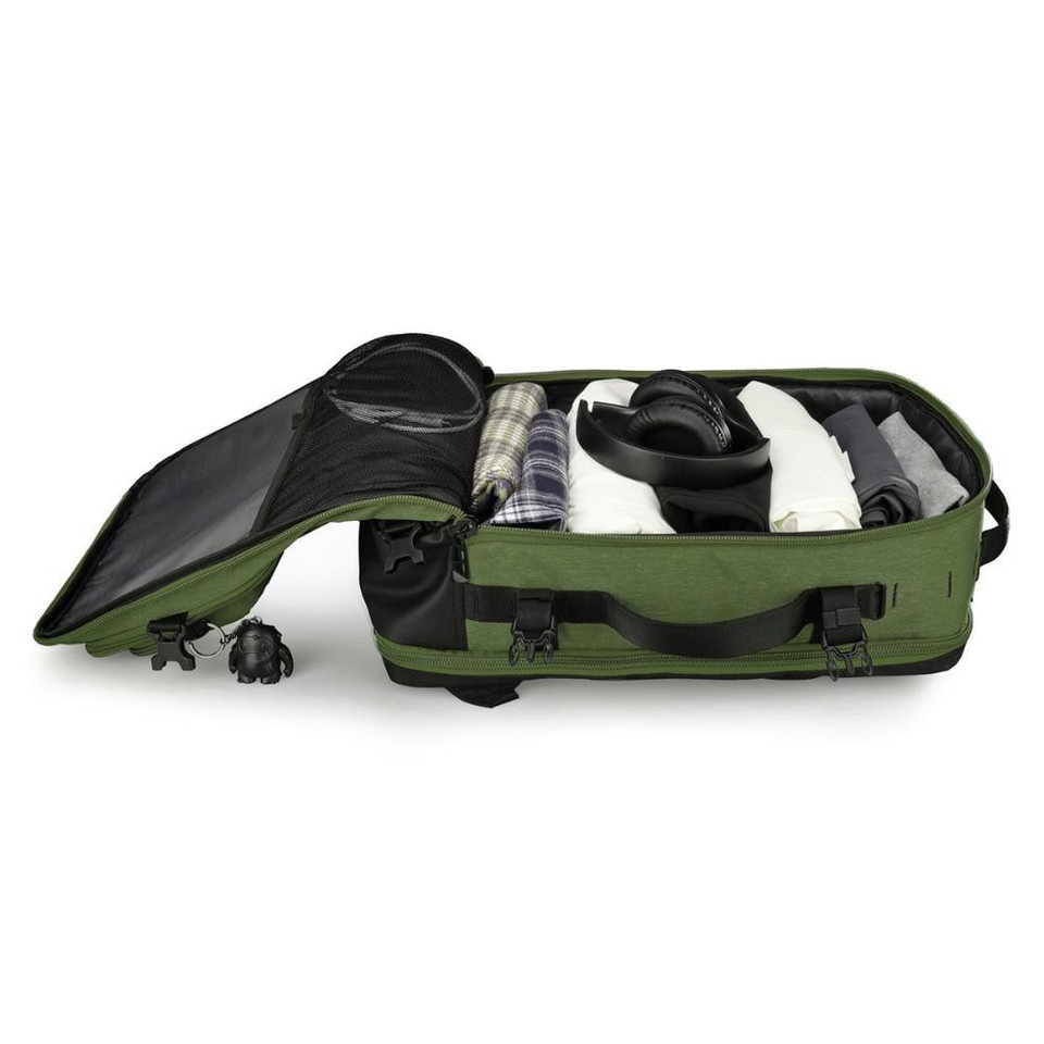 Green travel duffel bag neatly packed with clothing and headphones, open showing interior organization.