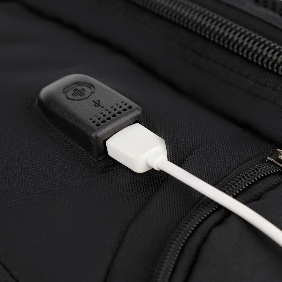 A black backpack featuring a USB charging port, made from durable fabric with a sleek design.