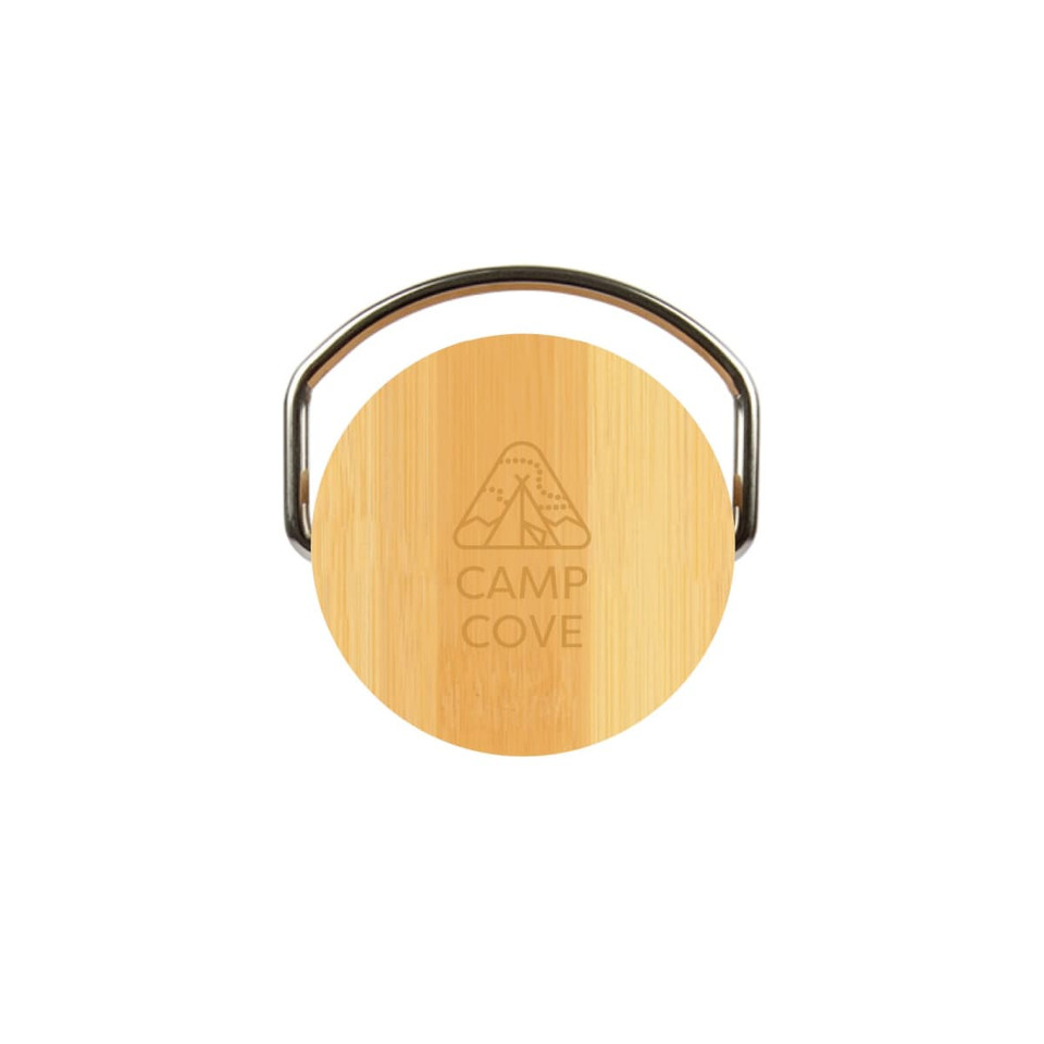 A drink bottle cap made of bamboo with a metal handle, featuring the engraved logo "CAMP COVE."