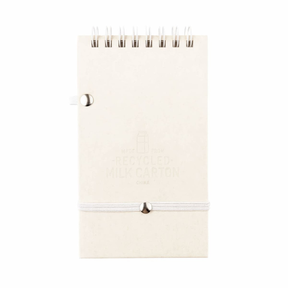 A white notepad made from recycled materials, featuring a spiral binding and a secure closure. It includes a pen.