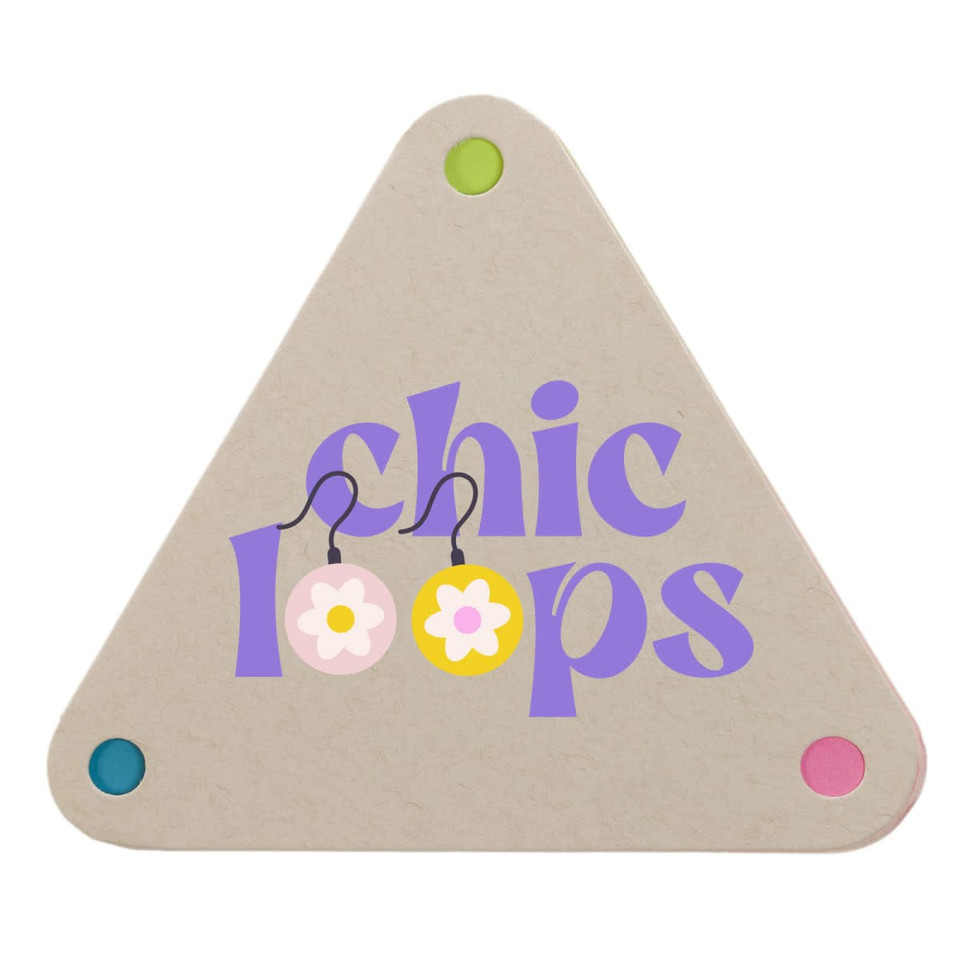 A triangular sticky note pad in beige with colorful corners, featuring the text "chic loops" in purple and floral graphics.