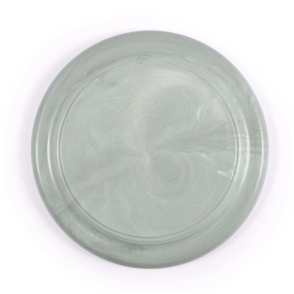 A frisbee featuring a marbled green design, showcasing a smooth finish with subtle swirling patterns.
