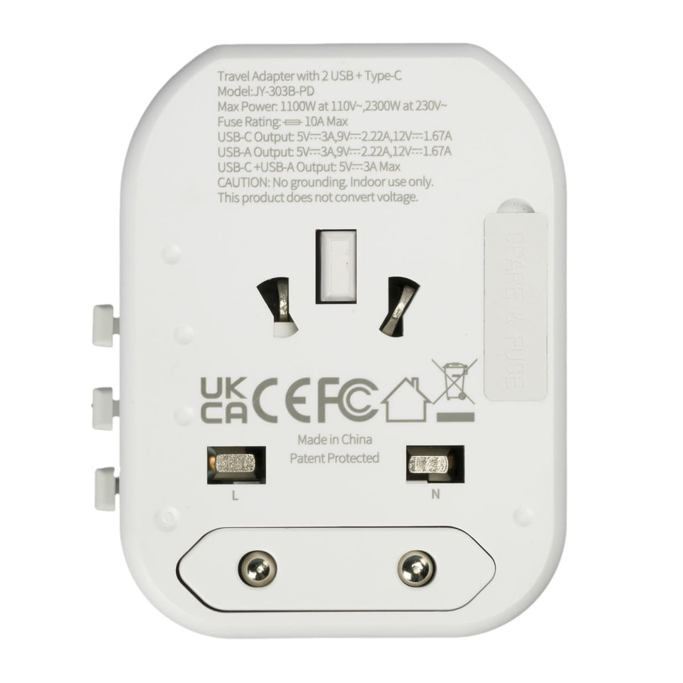 A white travel adapter with two USB ports, a Type-C port, and a UK plug design. It features electrical specifications on the body.