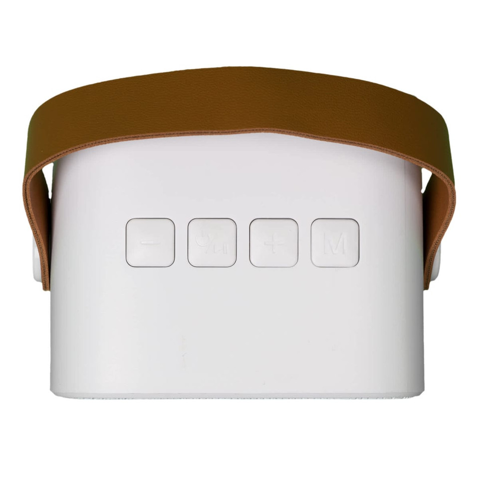 A white mini speaker with a brown strap and control buttons on the front, featuring a logo on the side.