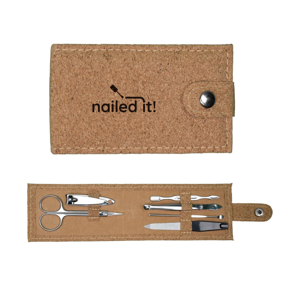 A cork manicure set featuring scissors, nail clippers, tweezers, nail files, and a snap closure.