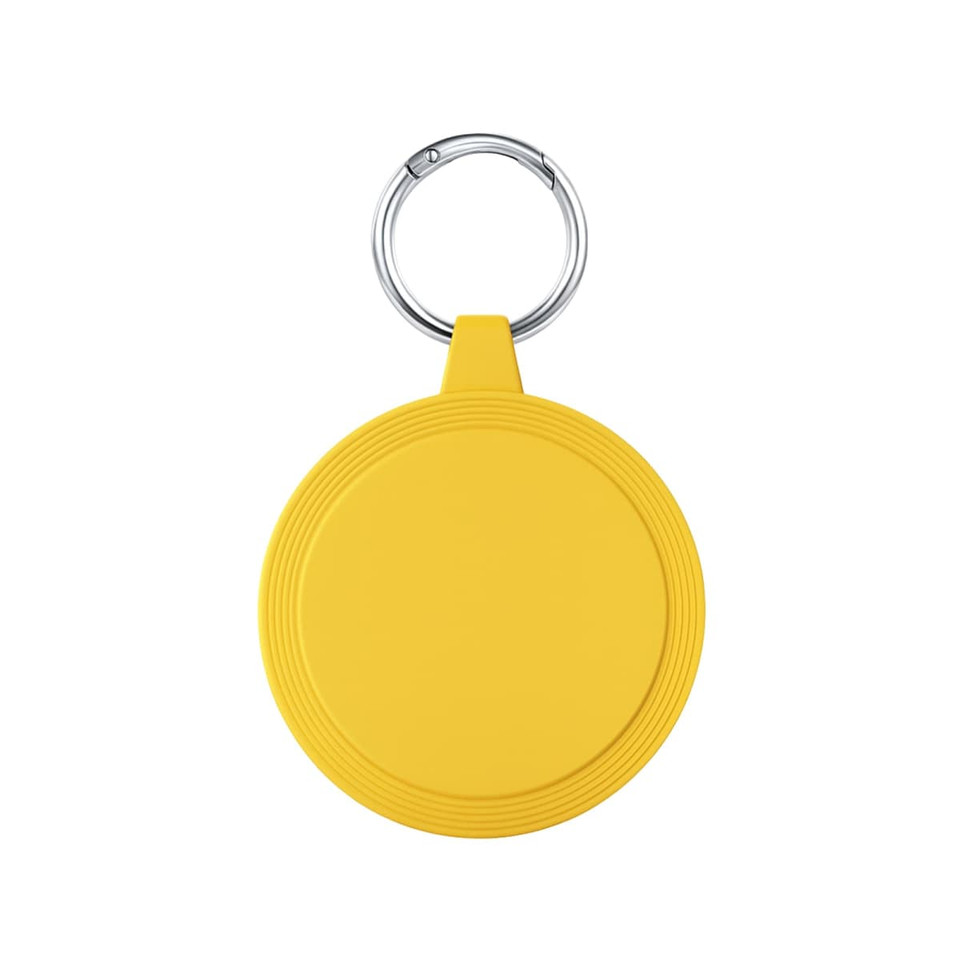A round yellow keychain with a textured edge and a metal ring for attachment.