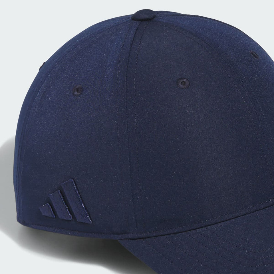 A navy blue cap featuring six panels and a branded logo on the side.