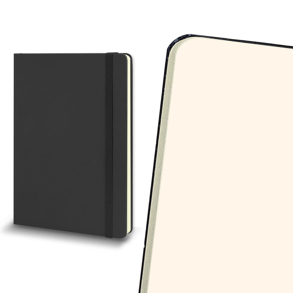 A large black hard cover notebook with an elastic band, featuring cream-coloured pages inside.