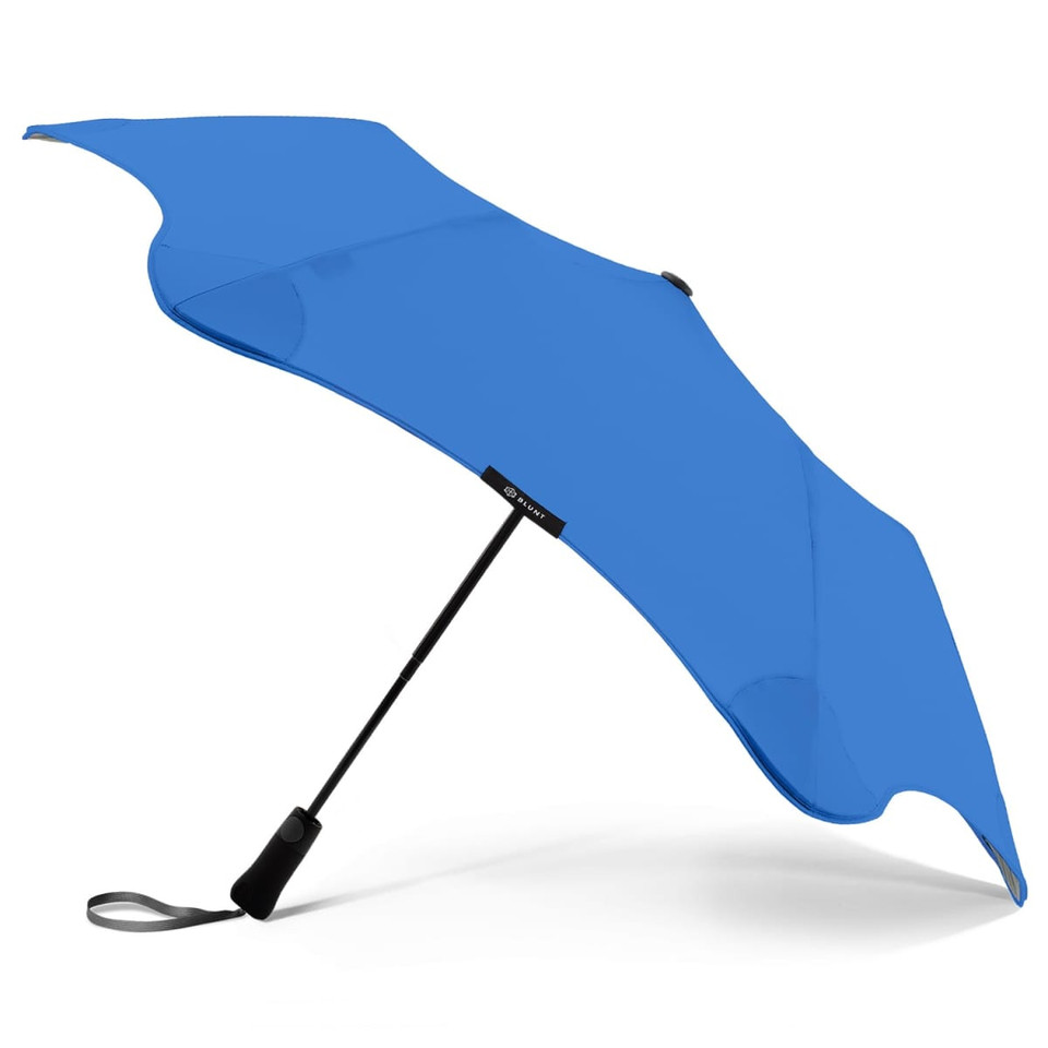 A blue BLUNT Metro Umbrella with a sleek design and a branding logo on the canopy.
