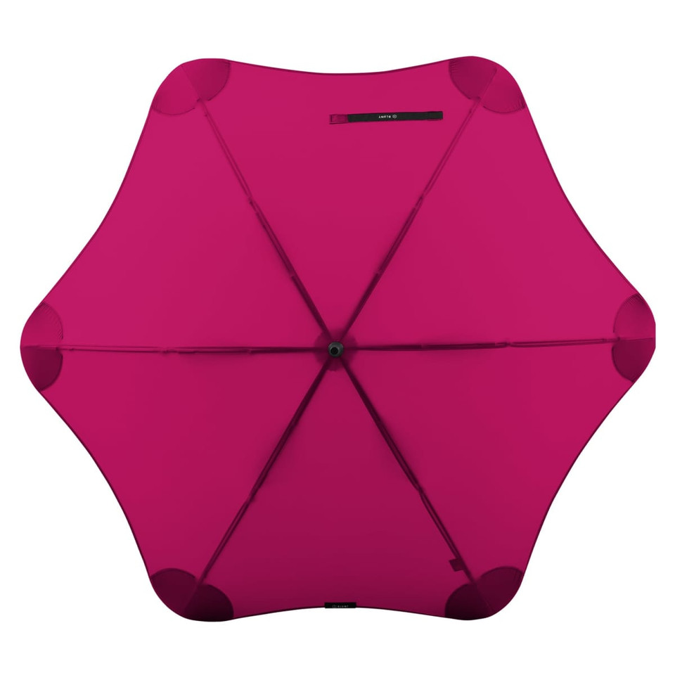 A fuchsia umbrella with a unique star shape and a central button, featuring a black logo.
