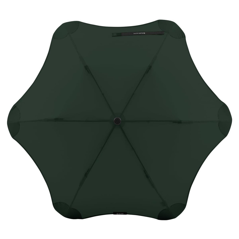 A green BLUNT Metro Umbrella featuring a sleek, rounded design and a central button for closure.