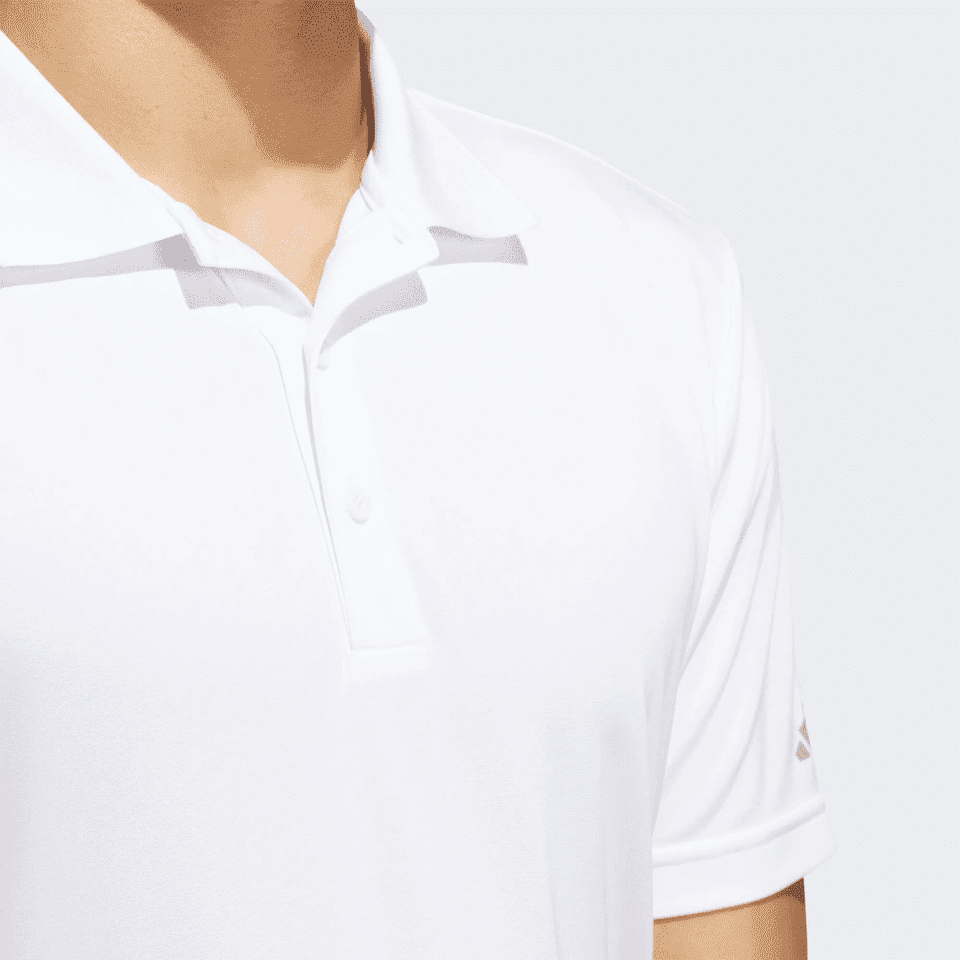 A white Adidas men's polo shirt featuring a collar and a logo on the sleeve.