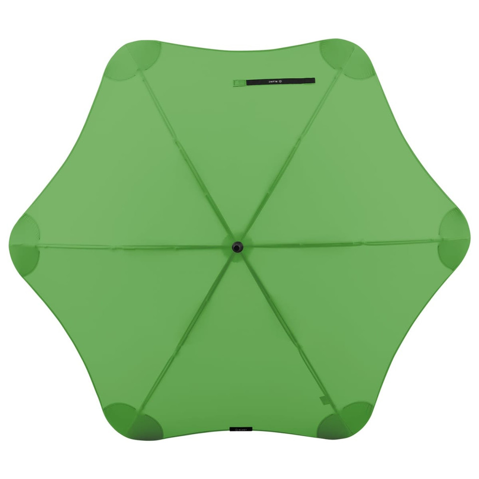 A green BLUNT Classic Umbrella with a star-shaped canopy and a central hub, featuring enclosed ribs and a branding logo.