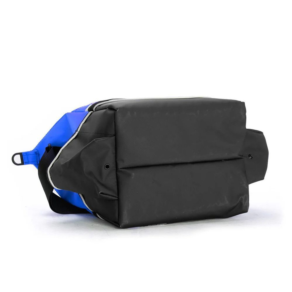 Rugged Xtremes blue and black crib bag with side pockets and striped panel, bottom view