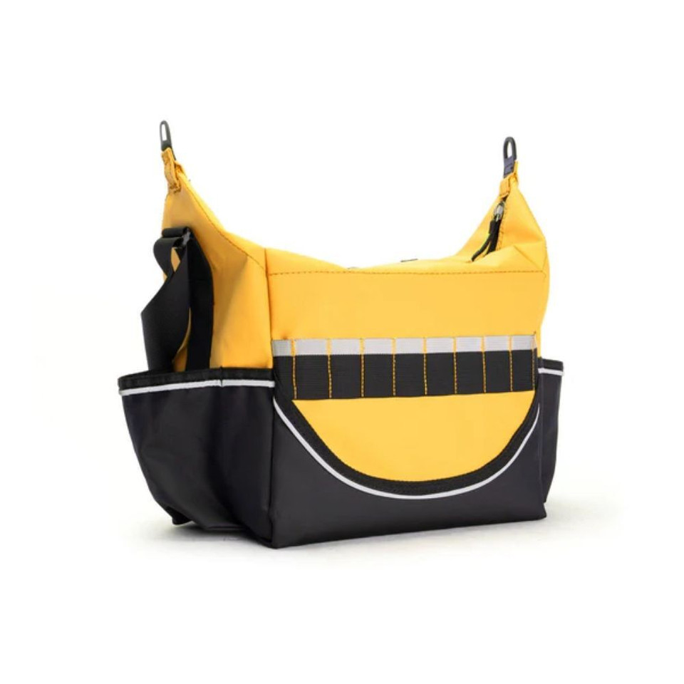 Yellow and black rugged crib bag with adjustable strap and front pocket, ideal for outdoor adventures, back view