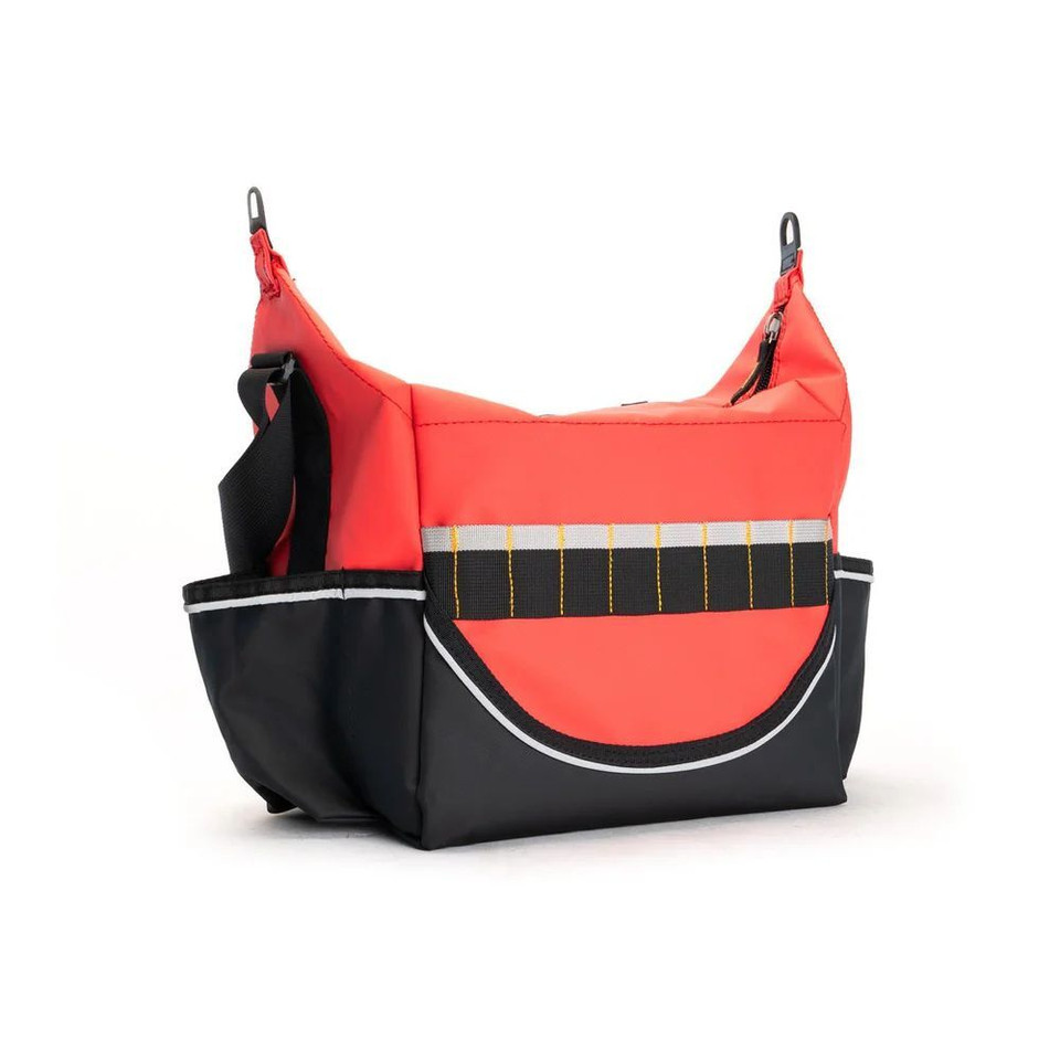 Red and black rugged crib bag with adjustable strap and front pocket, ideal for outdoor adventures, back view.