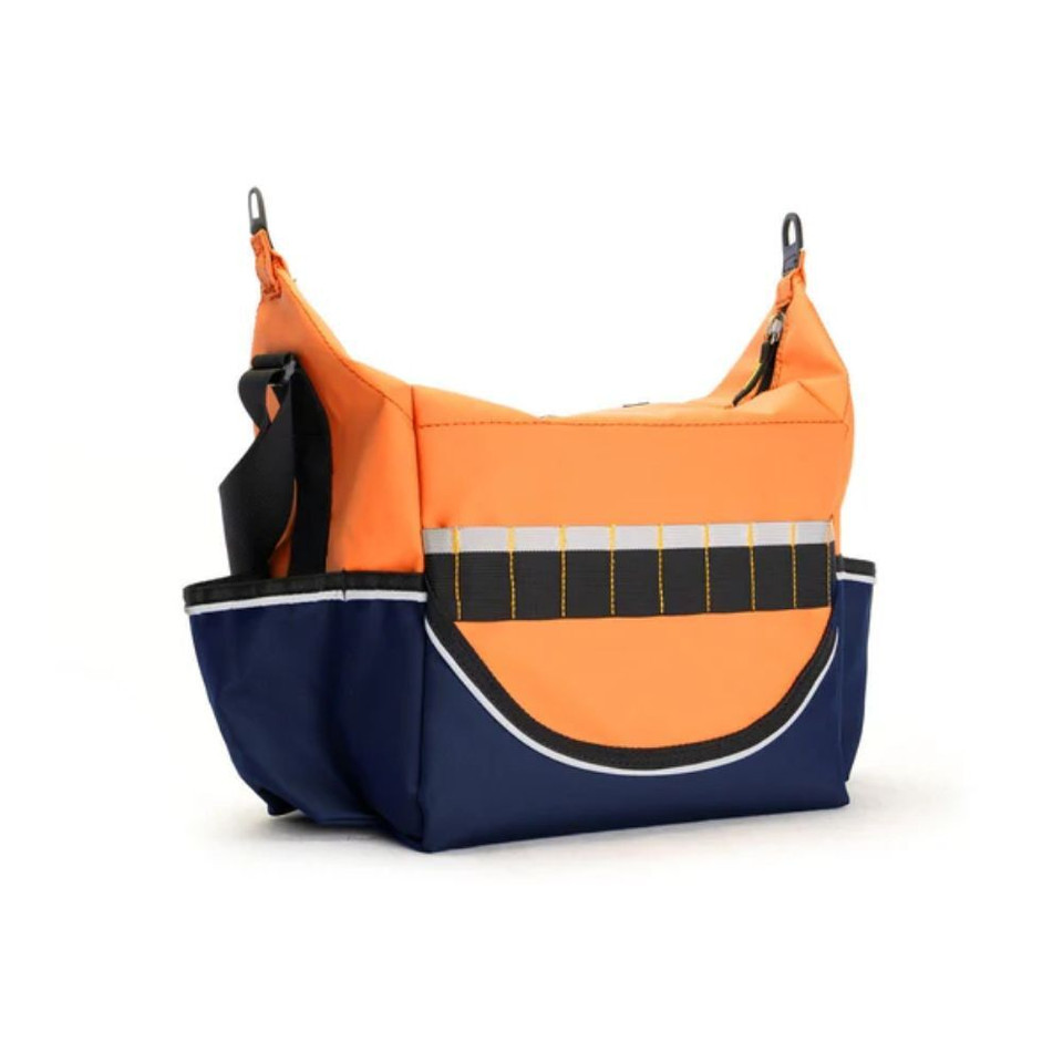 Orange and blue rugged crib bag with adjustable strap and front pocket, ideal for outdoor adventures., back view