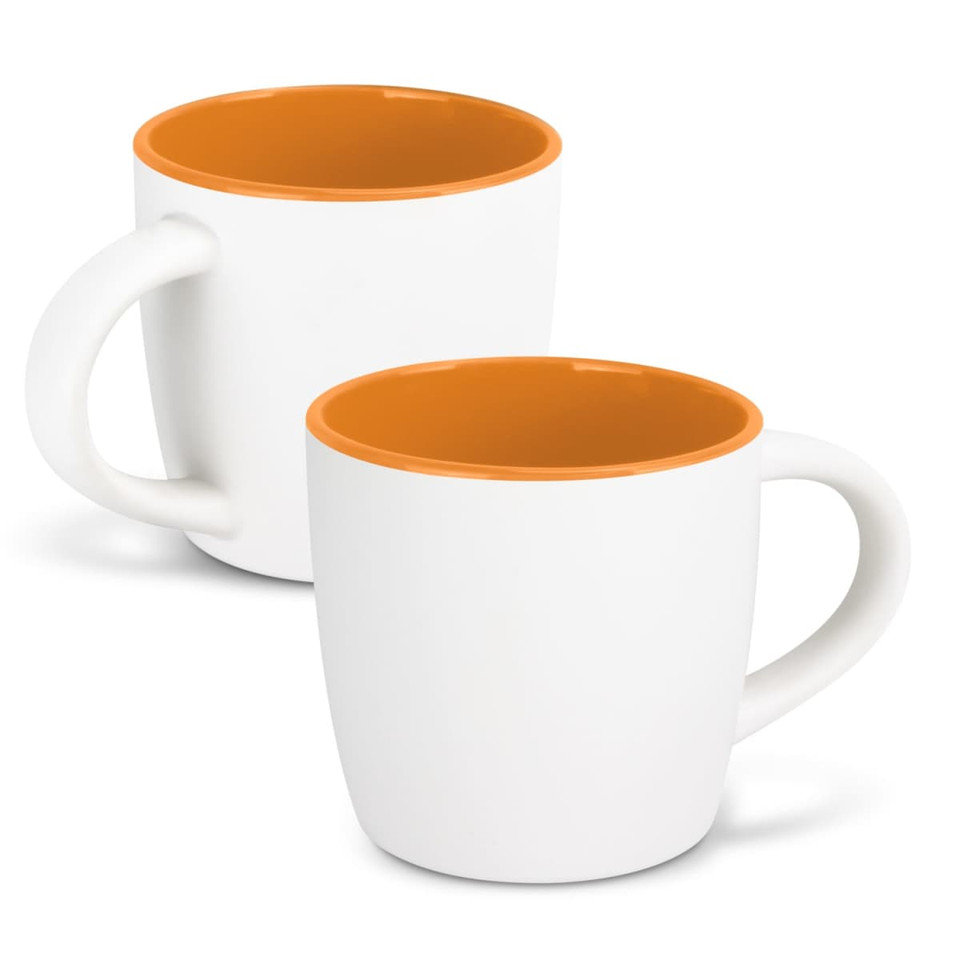 A two-tone coffee mug featuring a white exterior and orange interior, with a curved handle. Includes a logo.