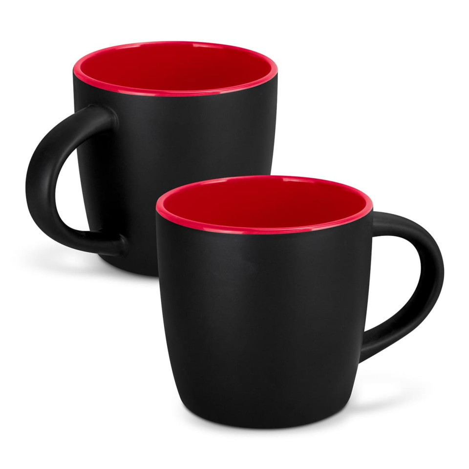 A coffee mug with a matte black exterior and a contrasting red interior, featuring a handle and a logo.