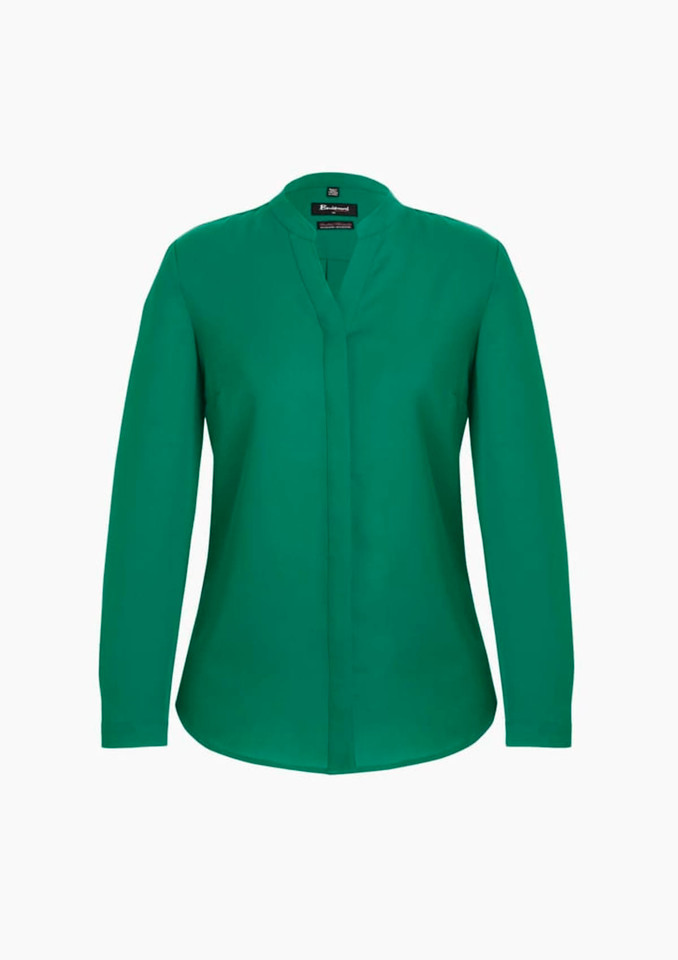 A green long sleeve blouse with a button-up front and a collar. The blouse features a logo on the tag.