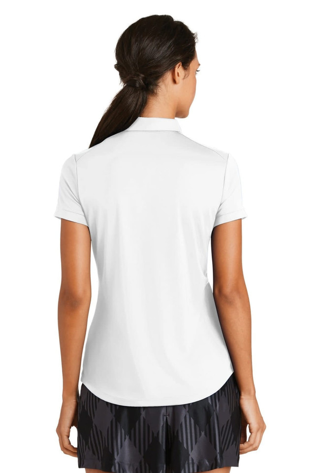 A white polo shirt with a modern fit, featuring short sleeves and a logo on the back.