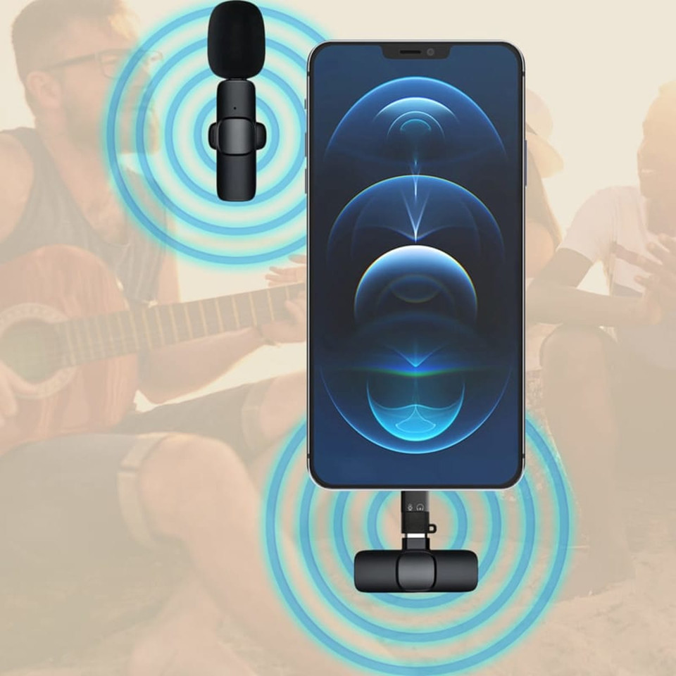 A wireless microphone in black is shown connected to a phone, with sound waves illustrated around it.