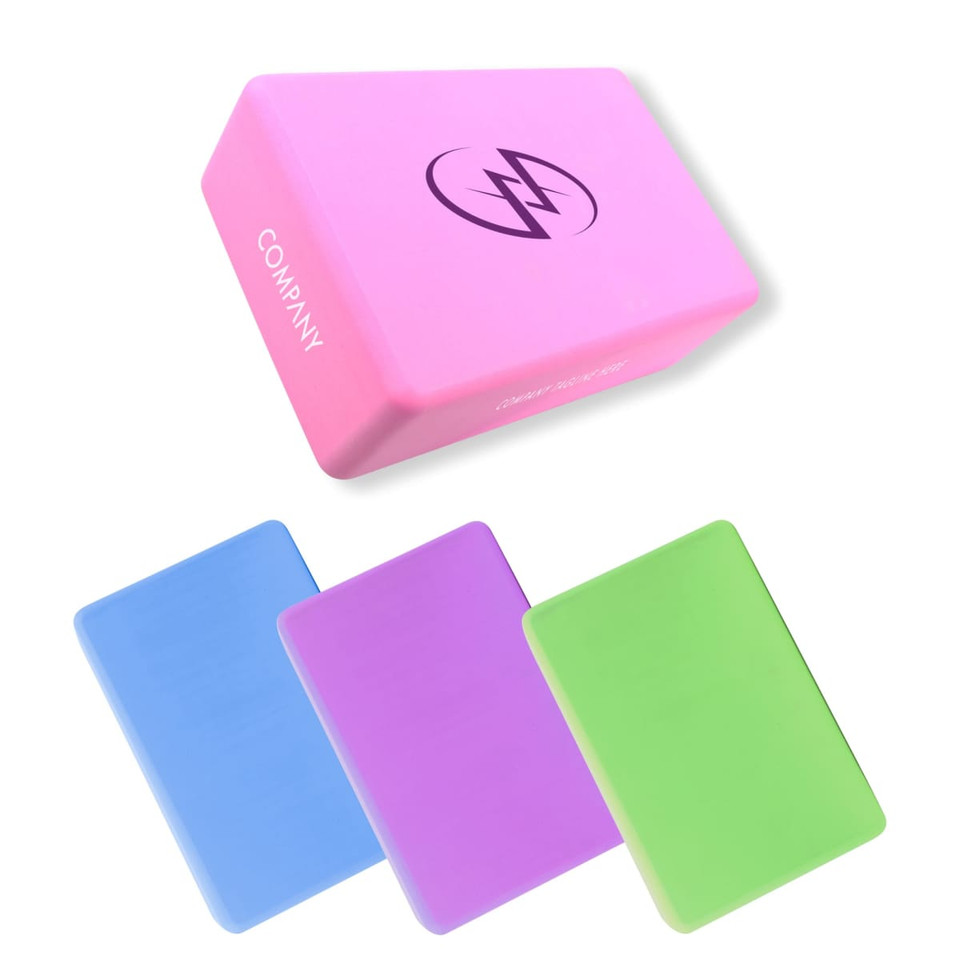A set of EVA yoga blocks in pink, blue, purple, and green with a logo on one side.