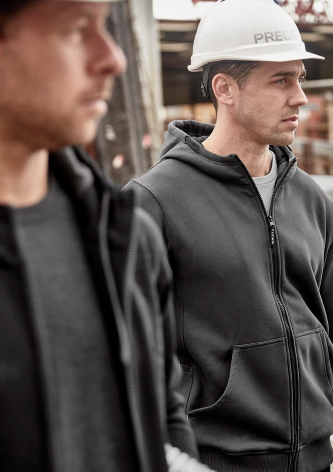 A grey unisex zip-front hoodie with multiple pockets is worn by two men, one wearing a hard hat in a work setting.