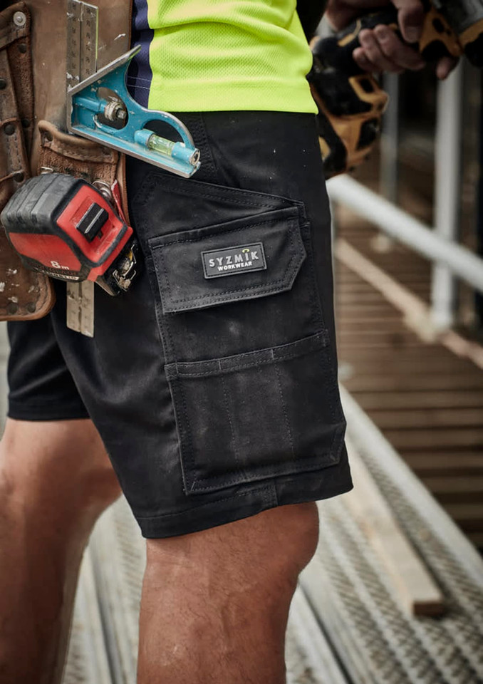 Black men's cargo shorts with multiple pockets, featuring a logo, ideal for work environments.