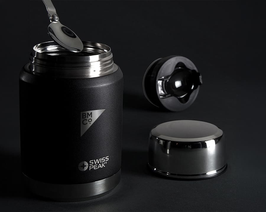 A Swiss Peak elite copper vacuum food container with laser engraved logo