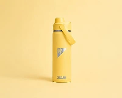 A yellow Camelbak thrive chug insulated steel bottle