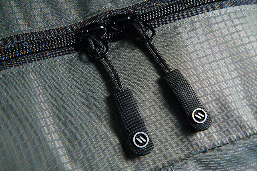 A close-up of an elleven zipper