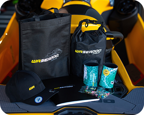 A collection of wa seadoo-branded merchandise displayed on a yellow watercraft