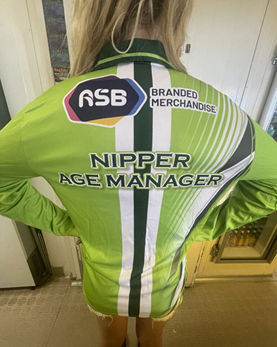 A close-up of the back of a female life saver's shirt